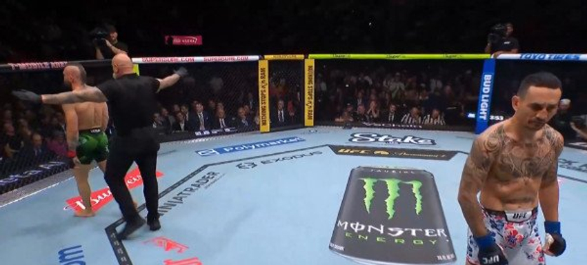 McGregor bie në rikthim  Holloway e mposht në raundin e parë