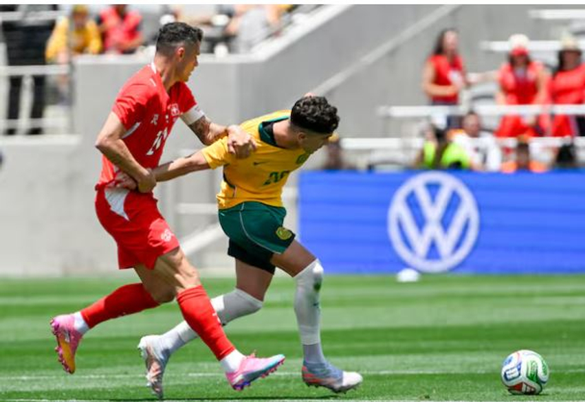 Xhaka asiston  Zvicra barazon me Australinë para Botërorit